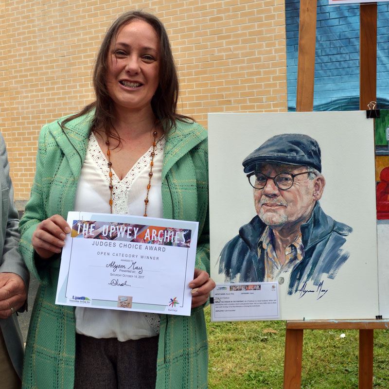 Alyson May with her portrait of “Mr. O’Sullivan” - WINNER of the 2017 Upwey Archies Portrait Prize Open Category.
